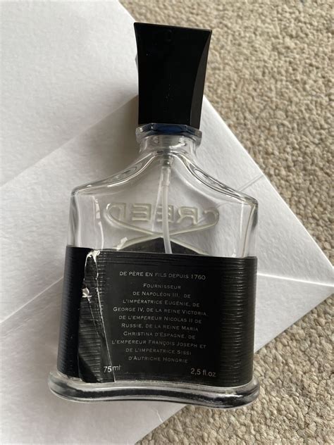 empty creed bottle.